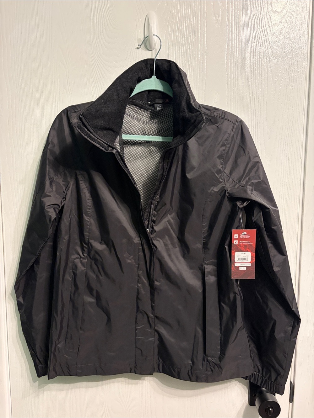 NWT Women's Black Swiss Tech Lightweight Waterproof Jacket size small.